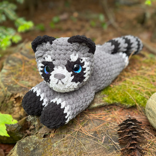 Laying Down Raccoon Crochet Plushie | Hand Painted Eye